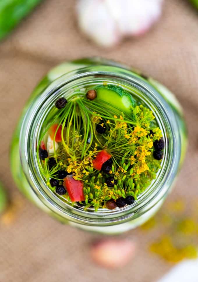 Overhead shot looking into a jar of pickles