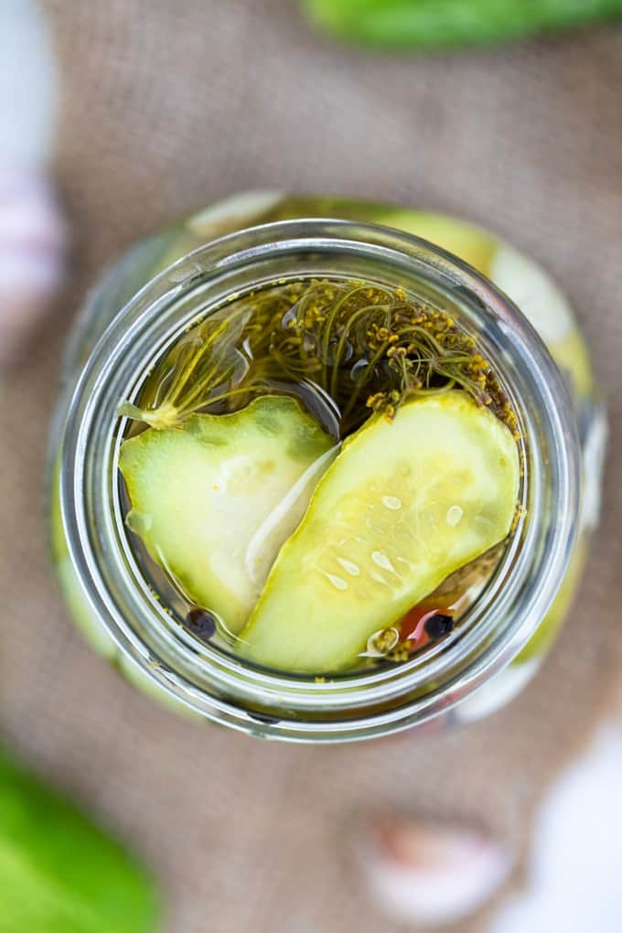 Overhead shot looking into a jar of pickles