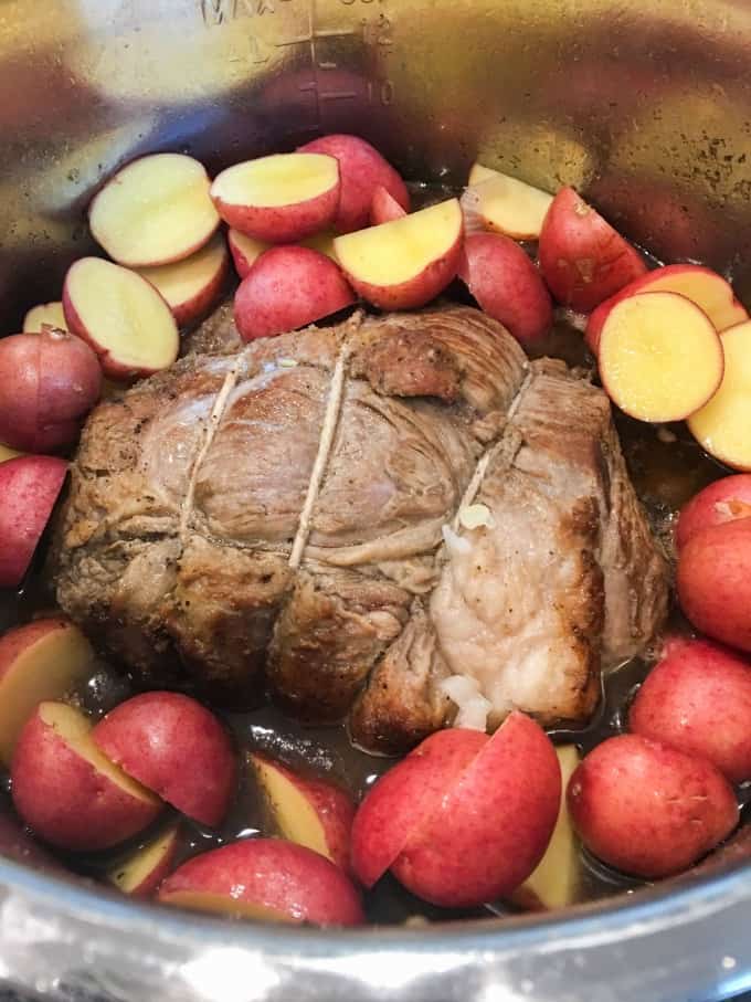 Roast Beef in a pressure cooker with red potatoes