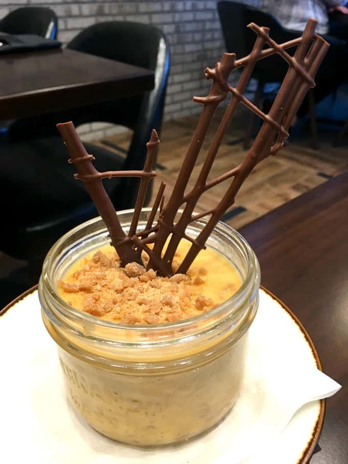 Salted Caramel Pudding in a jar with milk chocolate decoration