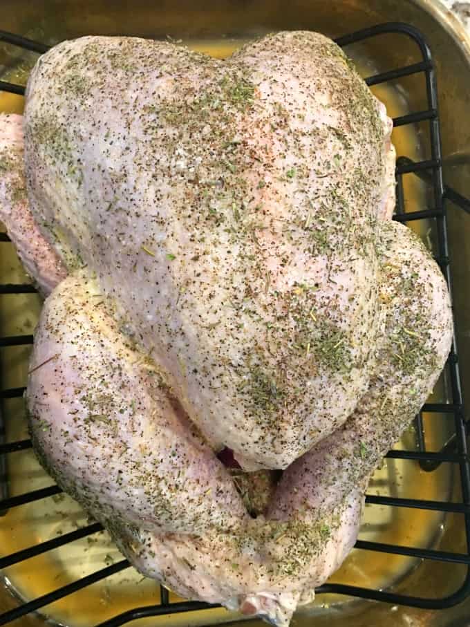 Turkey on a roasting rack about to go in the oven