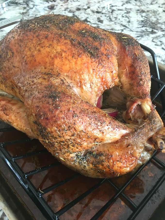 Roasted turkey on a rack out of the oven