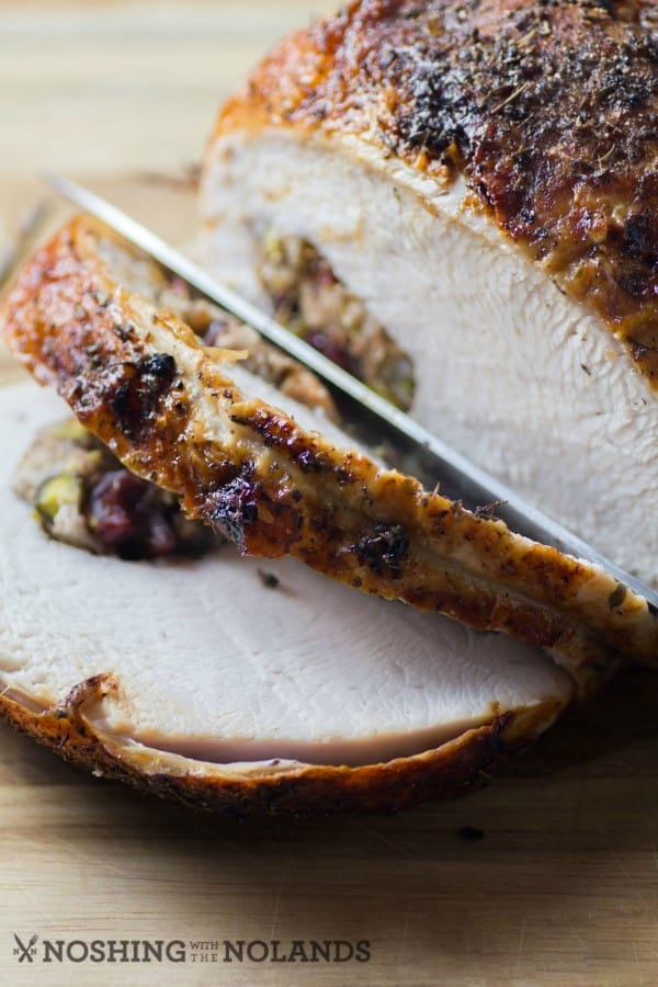Slicing a roased and stuffed turkey breast