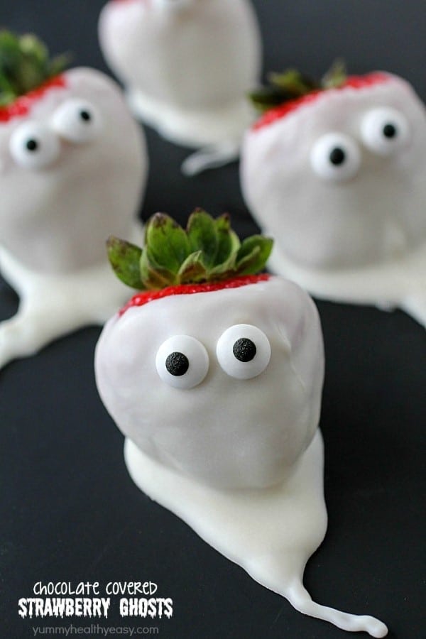 White dipped strawberries with eyeballs