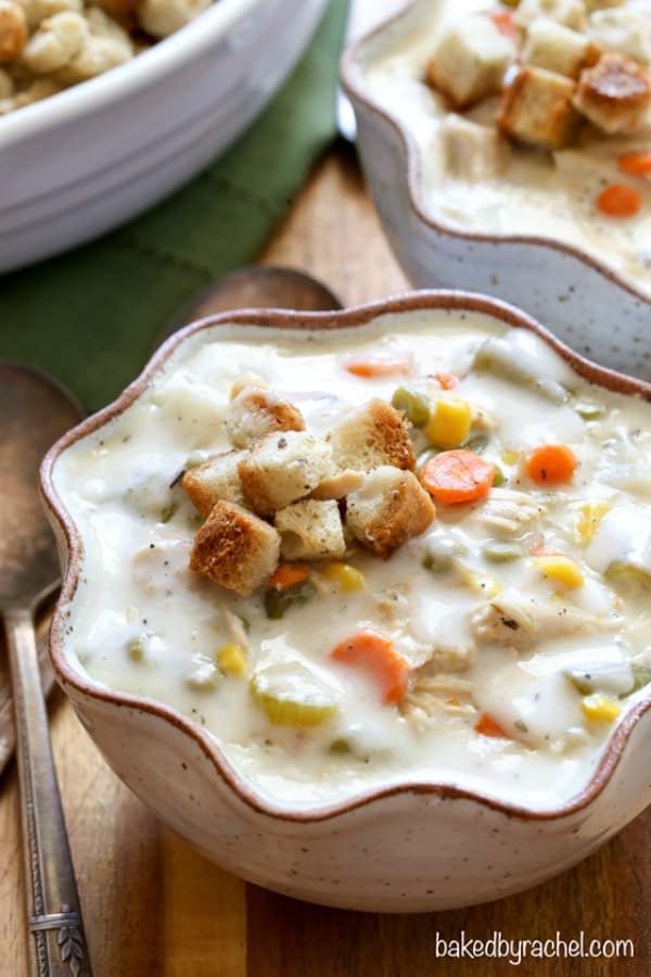 Slow Cooker Leftover Thanksgiving Turkey Pie Soup in a wavy ceramic bowl