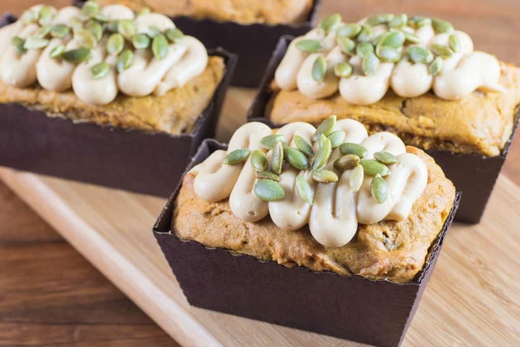 https://noshingwiththenolands.com/wp-content/uploads/2018/10/Mini-Pumpkin-Bread-with-Salted-Carmel-Buttercream-2.jpg