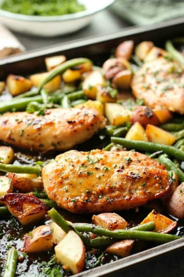 Chicken, potatoes and green beans on a sheet pan