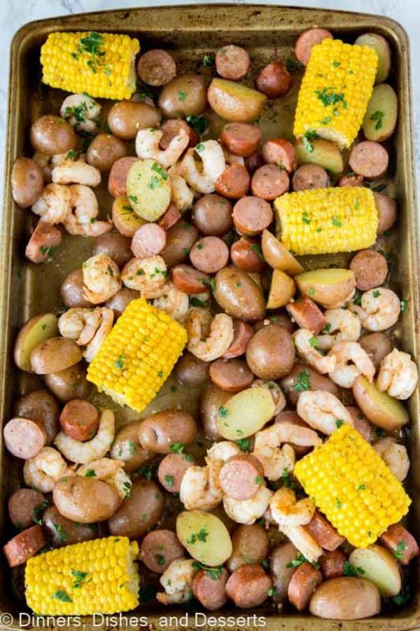 Shrimp, potatoes and corn on a sheet pan