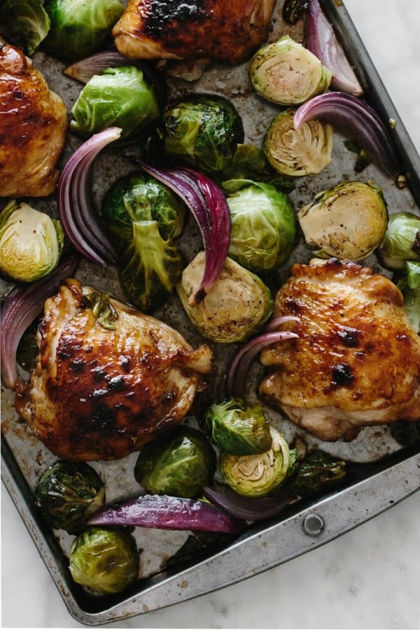 Chicken with onions and Brussel sprouts on a sheet pan