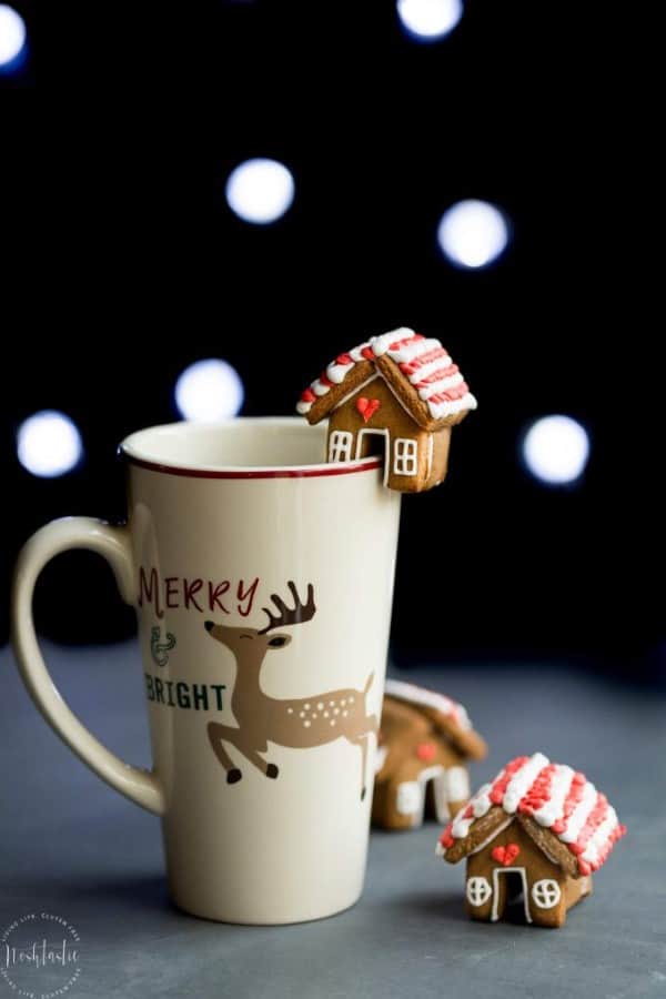 Mini Gingerbread Mug Topper on the side of a holiday mug. 