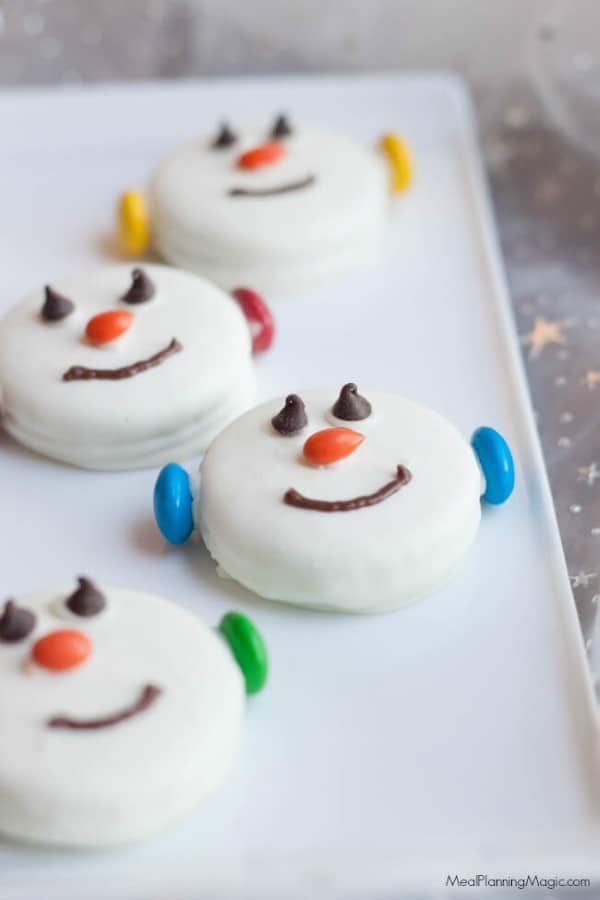 Snowman Oreo Cookies on a white platter.