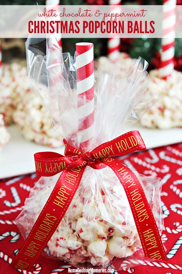 Christmas Popcorn Balls wrapped up in cello and tied with holiday ribbon. 