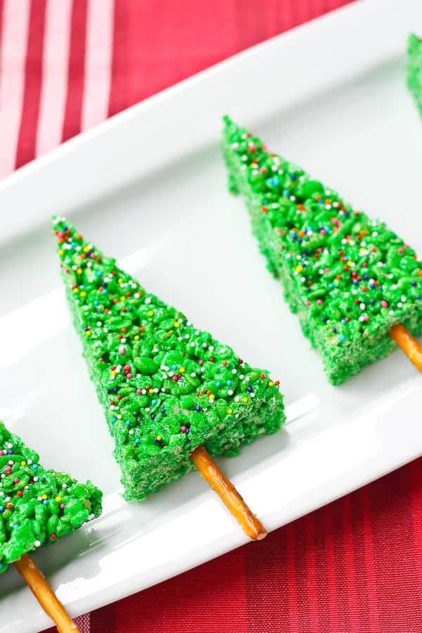 Christmas Tree Rice Krispie Treats on a white platter. 