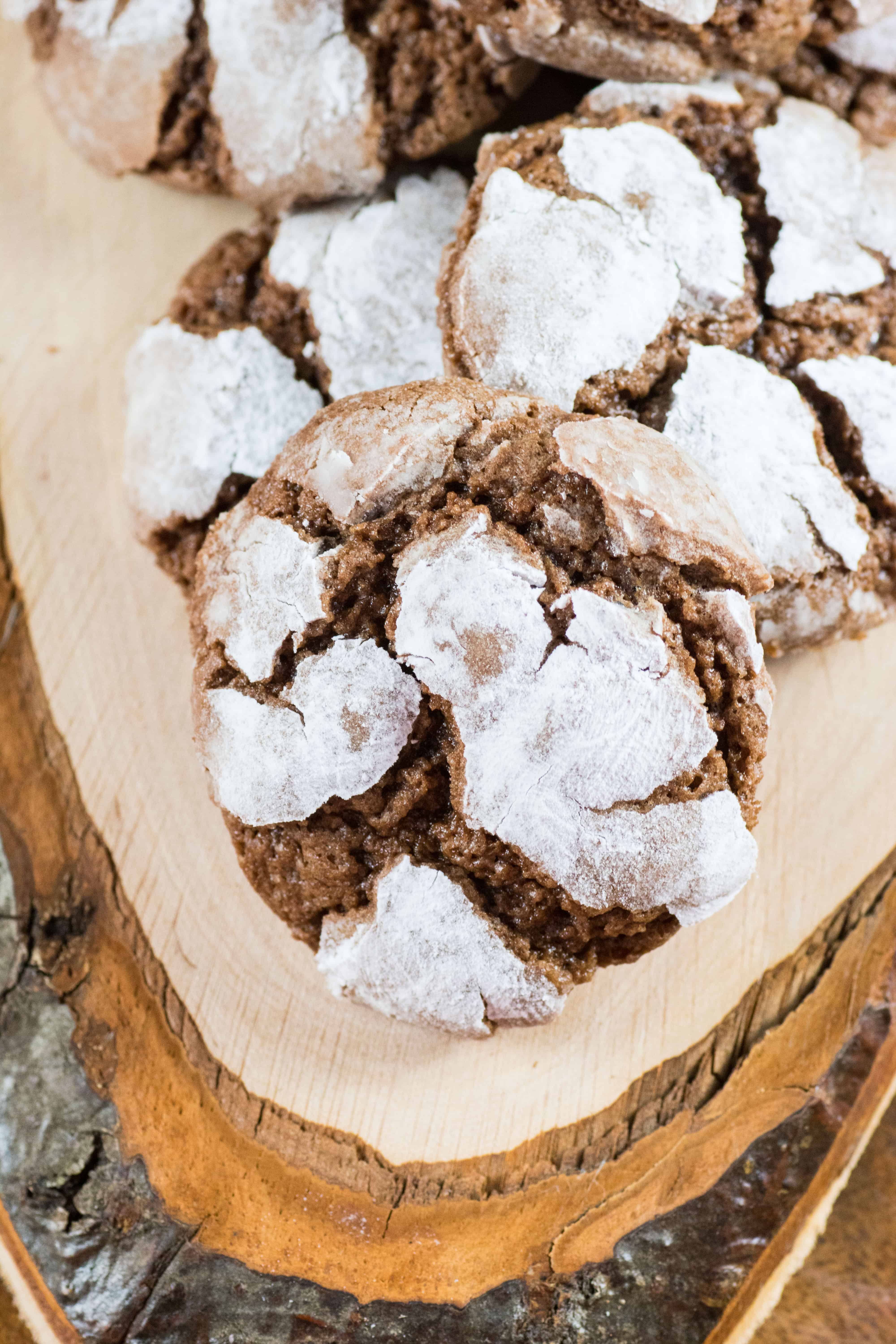 Chocolate Crinkle Cookies on a wooden board