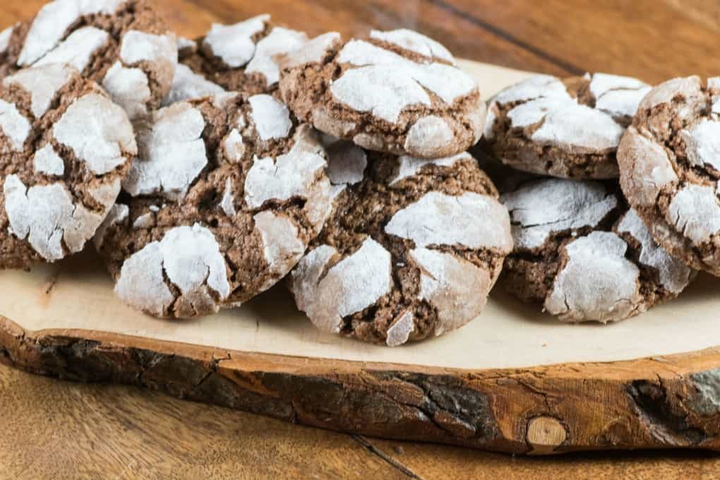 Chocolate Crinkle Cookies on a wooden board