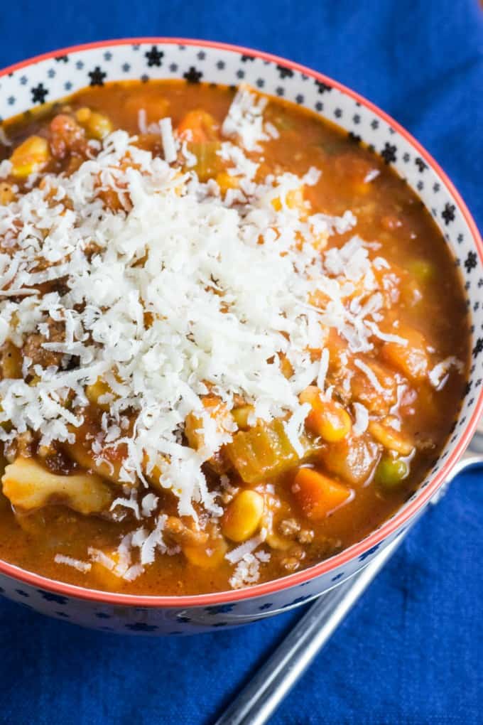 Bowl of minestrone soup topped with Parmesan cheese