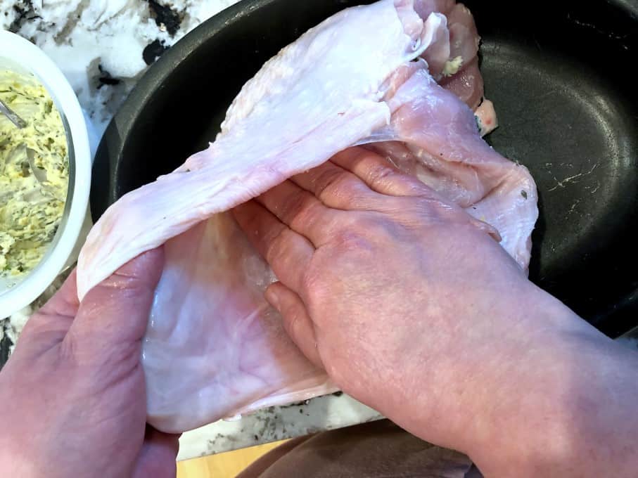 Separating the skin fro the breast. 