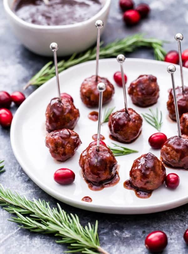 Rosemary turkey meatballs with cranberry balsamic sauce on a white serving tray