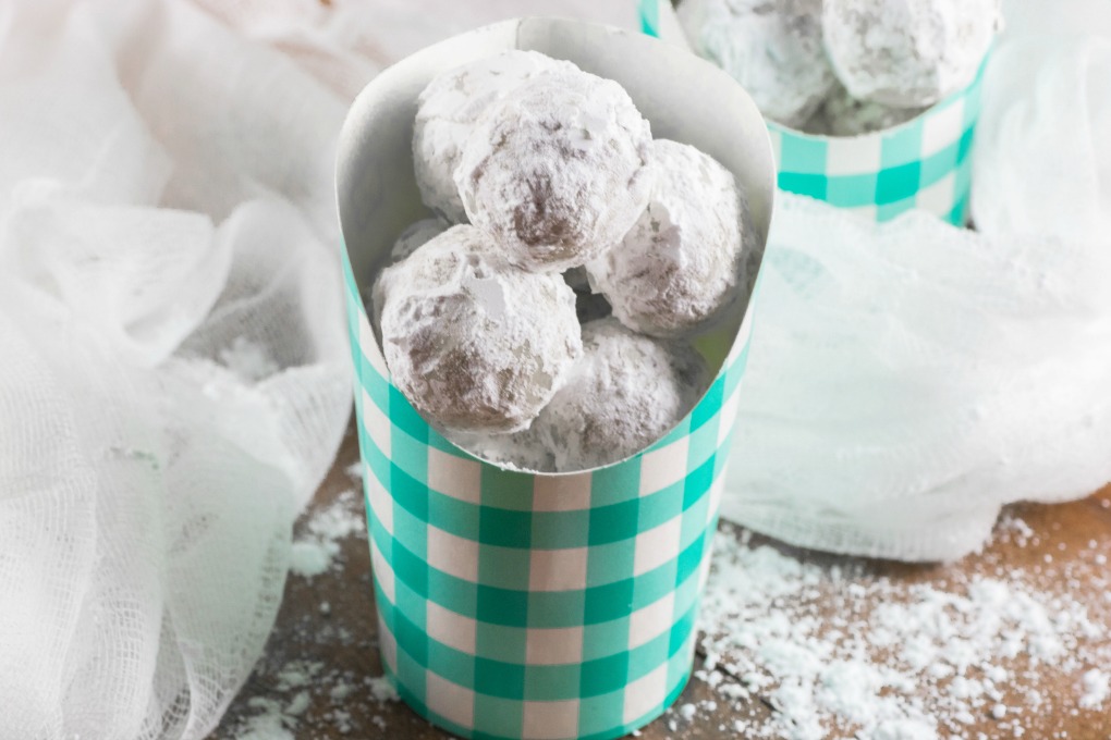 Snowball Cookies in checkered paper containers