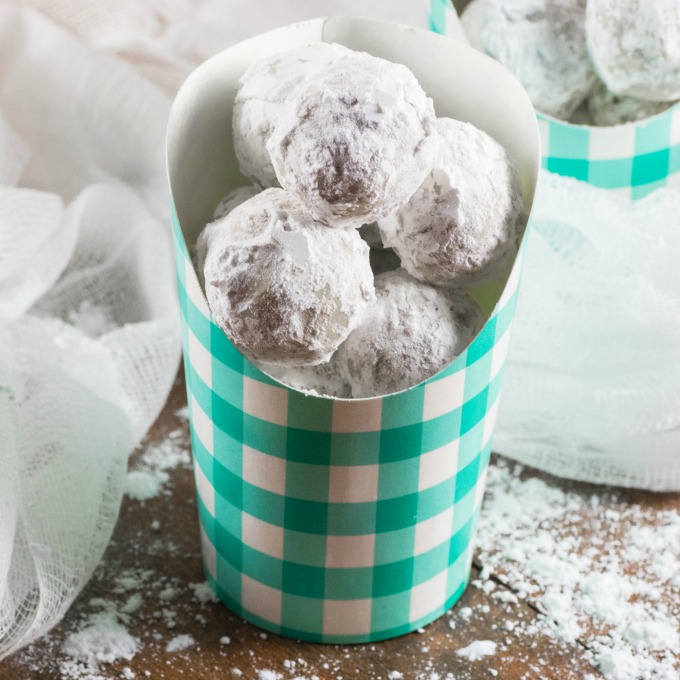 Snowball Cookies in checkered paper containers