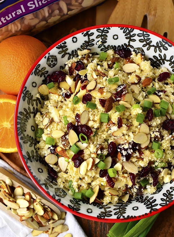 Easiest cauliflower couscous salad in a colorful service bowl