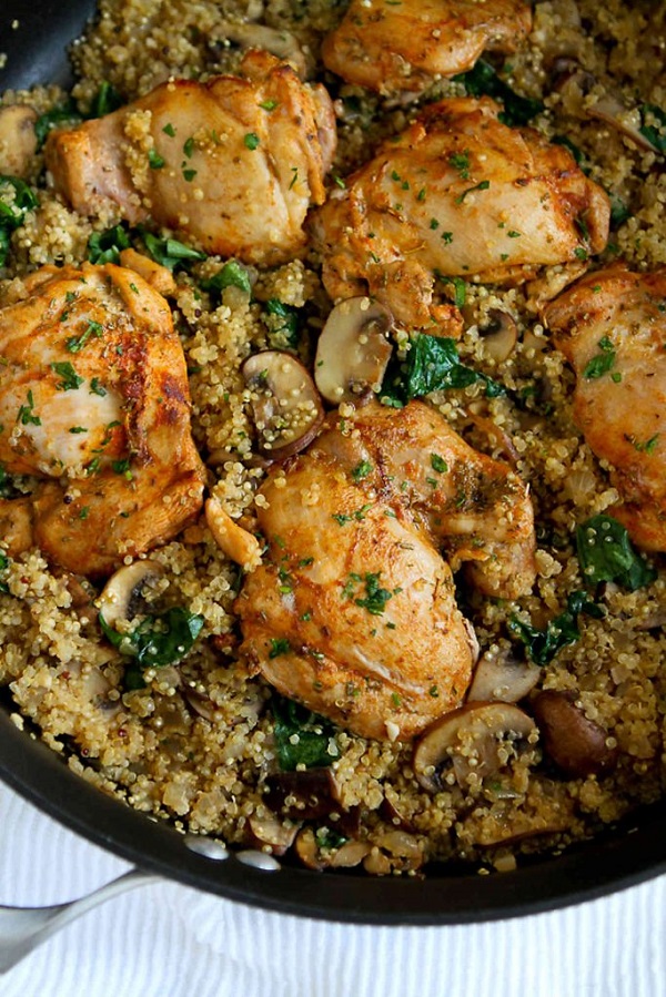 One Pot Chicken, Quinoa, Mushroom & Spinach Recipe in a skillet