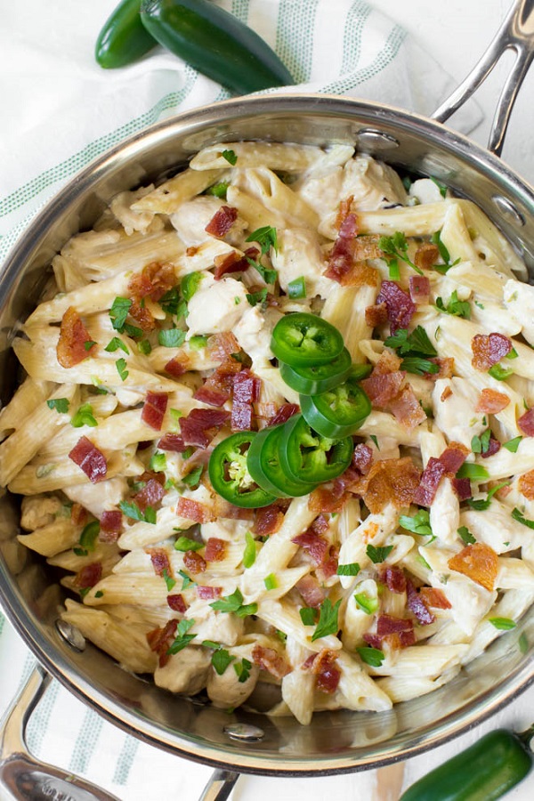 One Pot Creamy Jalapeno Popper Chicken Pasta in a skillet with jalapeno