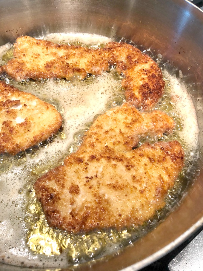 Frying turkey cutlets in oil in a saute pan