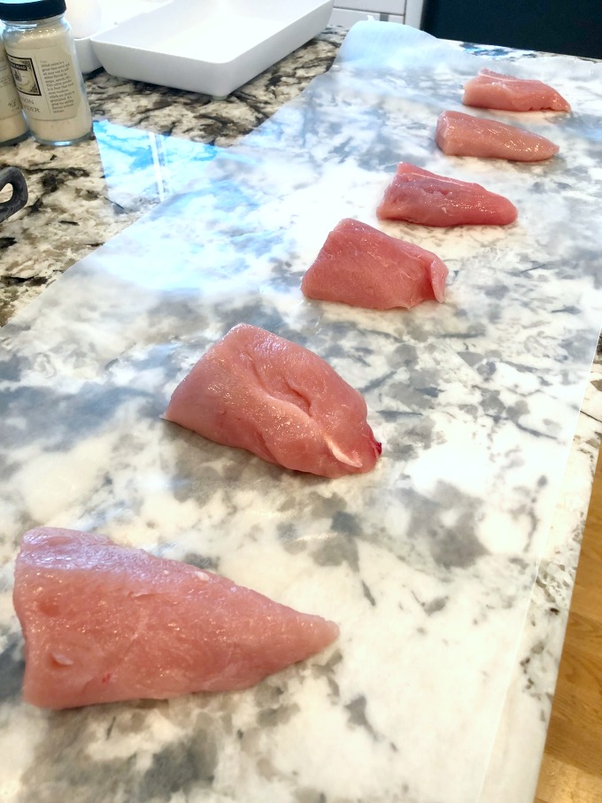 Turkey fillets on wax paper