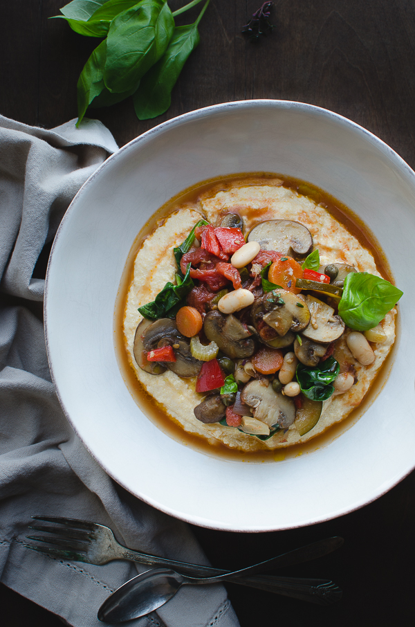 Vegetable Cacciatore with Soft Polenta in a white bowl