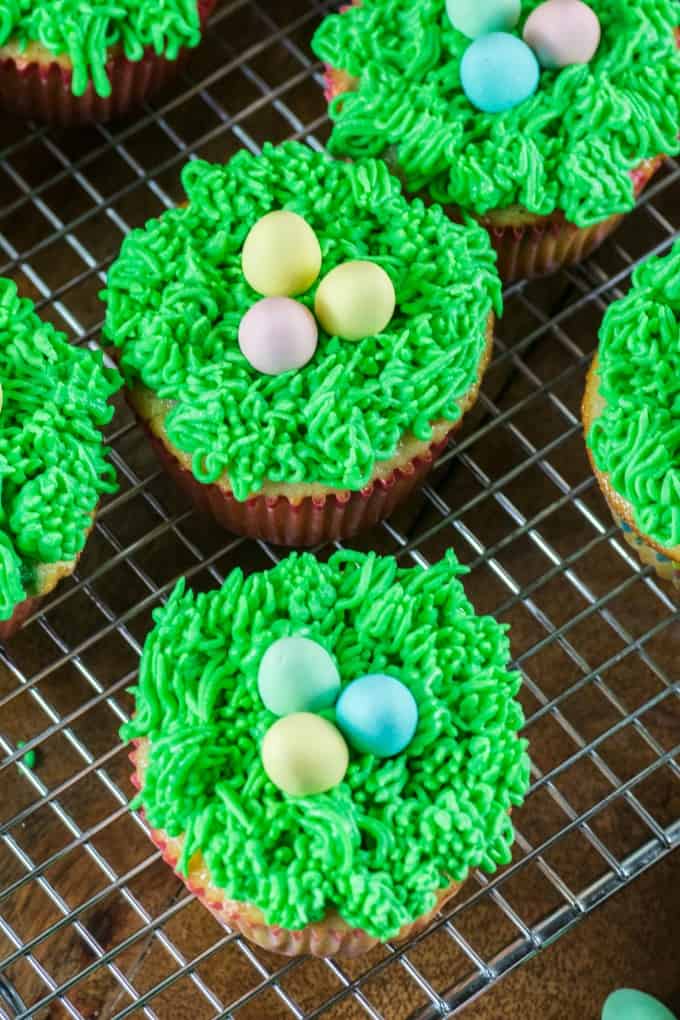 Easter cupcakes on a wire rack. 