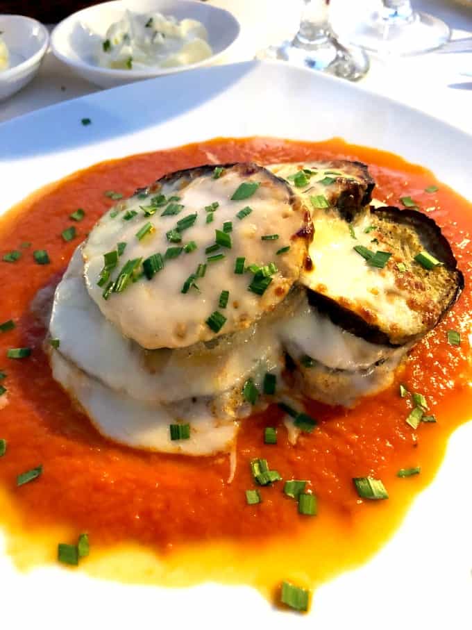 Eggplant Parmesan on a white plate