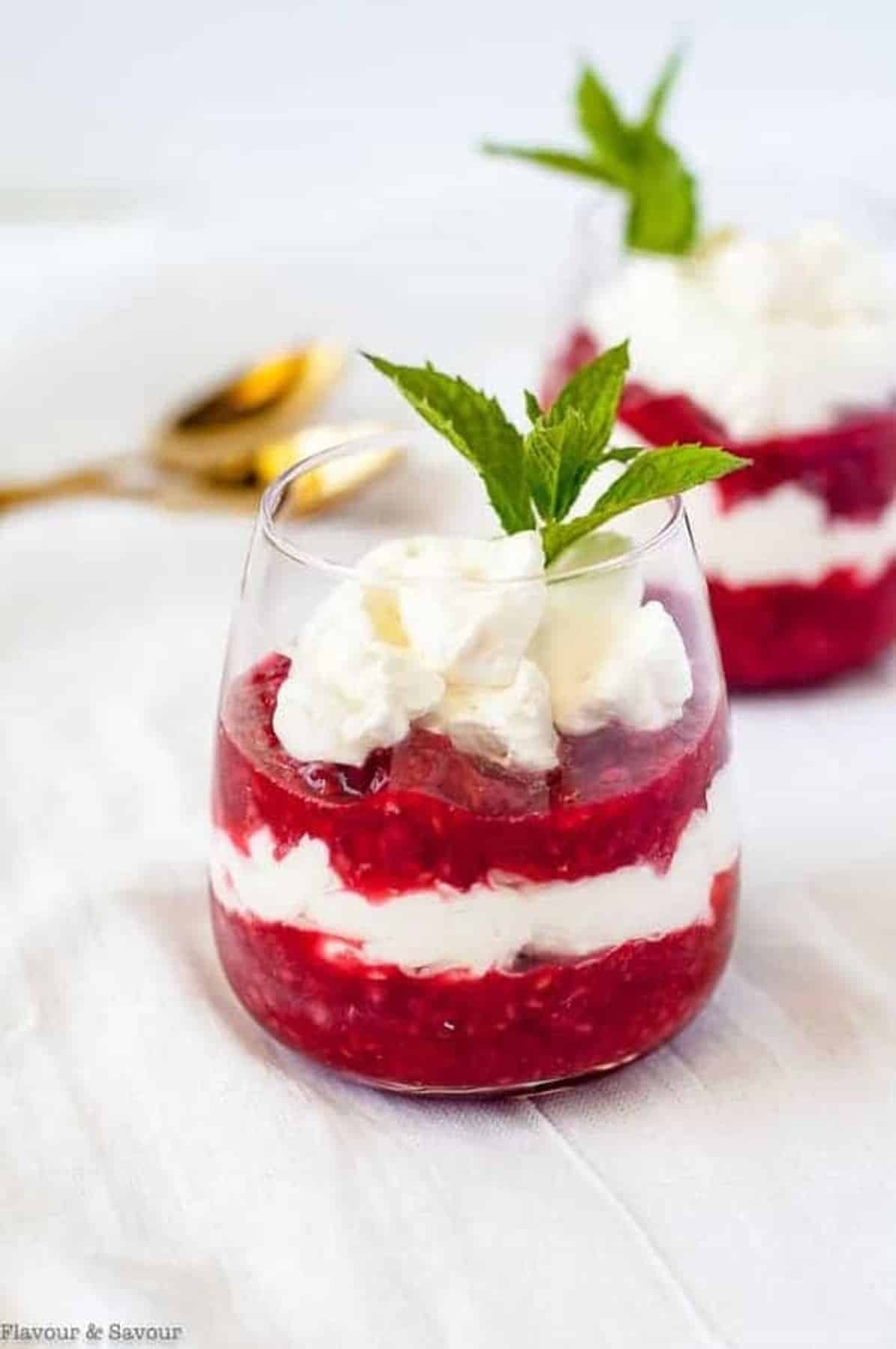 Easy Raspberry Rhubarb Fool Recipes in clear glasses with mint.