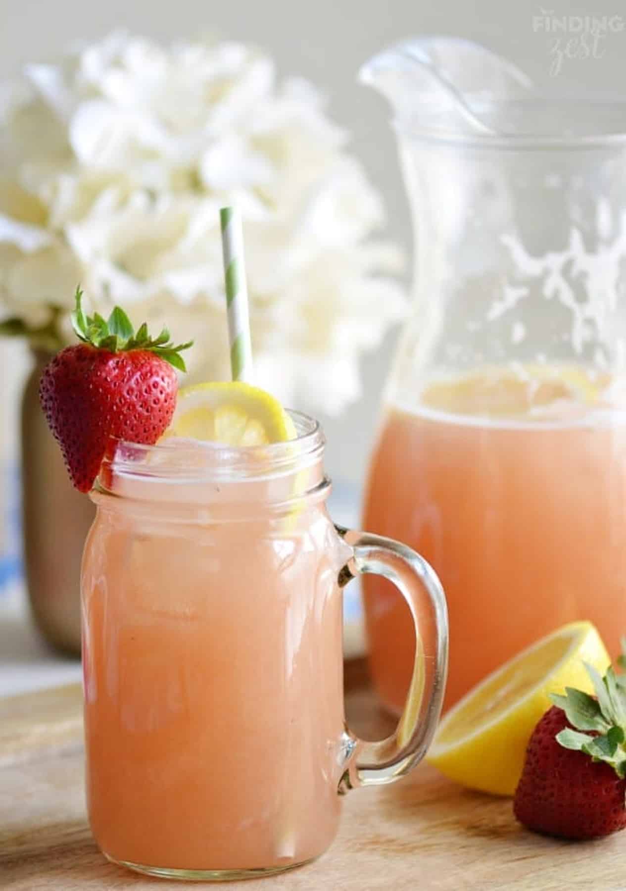 Homemade Strawberry Rhubarb Lemonade in a mason jar mug.