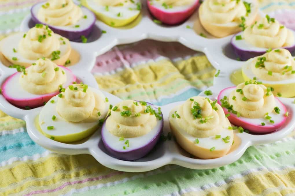 Rainbow Deviled Eggs in an egg platter