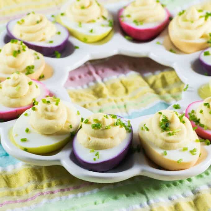 Rainbow Easter Deviled Eggs on an egg platter