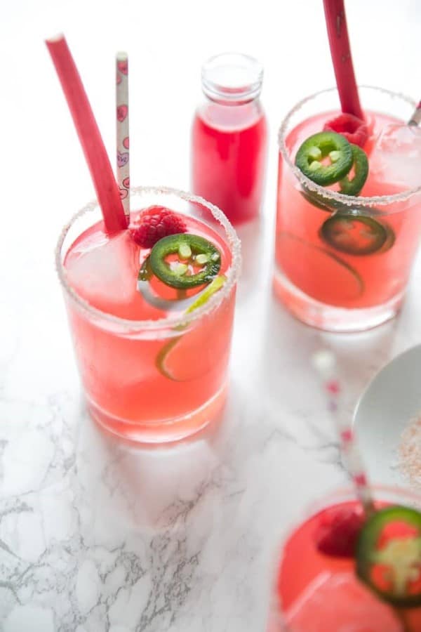 Raspberry Rhubarb Margaritas with jalapenos and straws