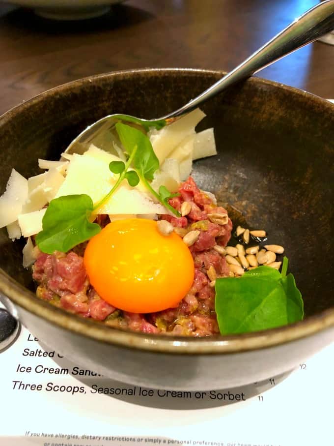 Beef Tartare with egg, Grand Padano and seeds