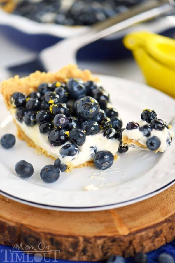 No Bake Blueberry Lemon Cream Pie on a white plate on a round board
