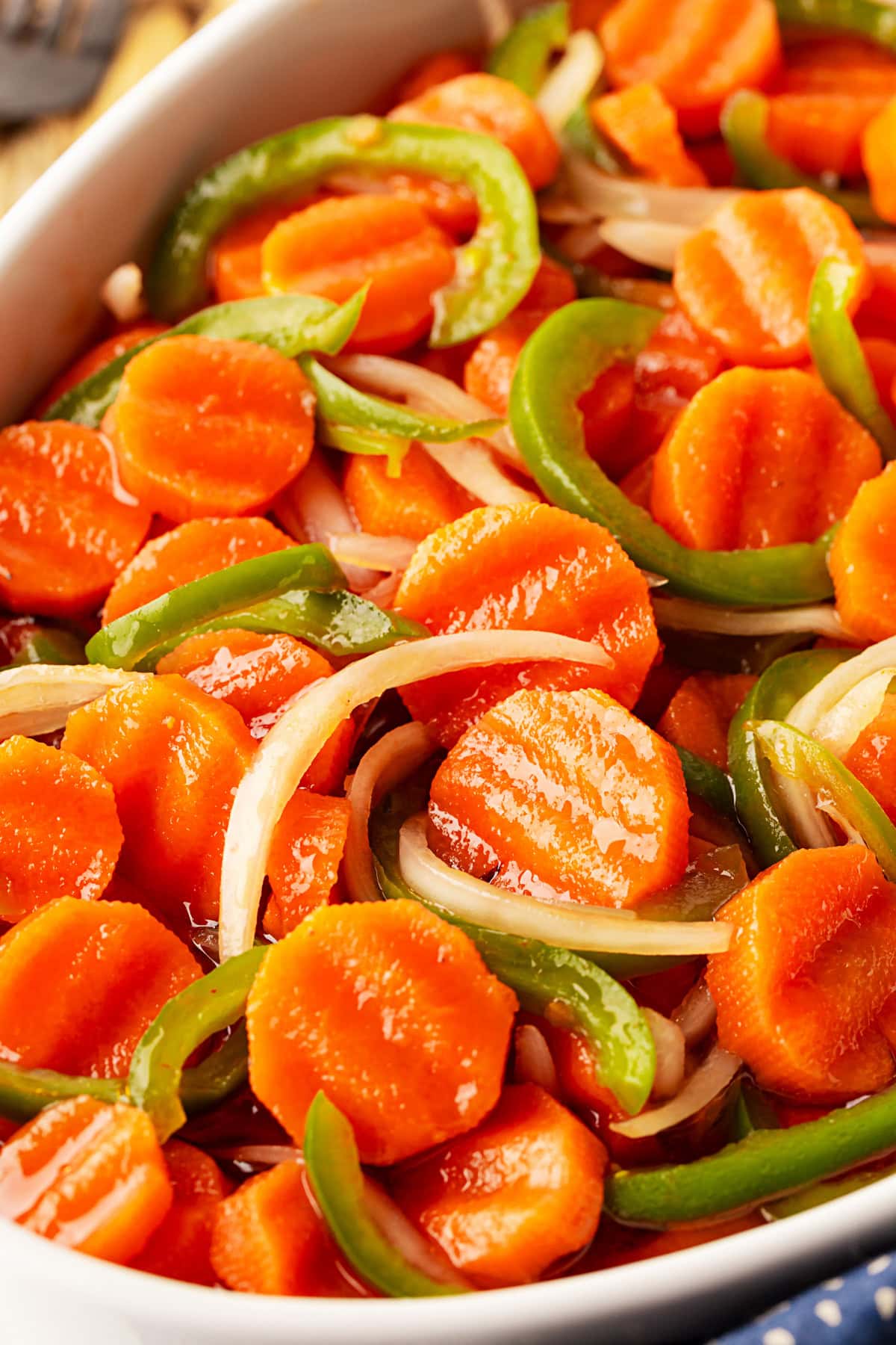 This Marinated Carrot Salad was a staple in our fridge as I grew up. It can be marinated for a long time, so it is perfect to have at the ready for any outing. Gorgeous Marinated Carrot Salad.