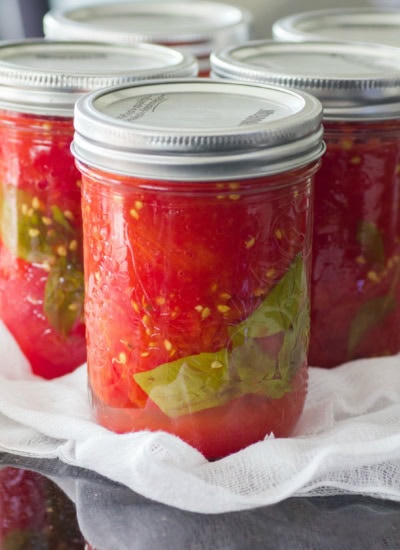 Jars of canned tomatoes.