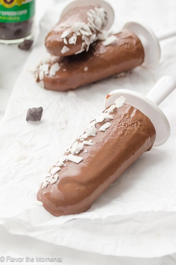 Coconut mocha fudgesicles on a white paper towel