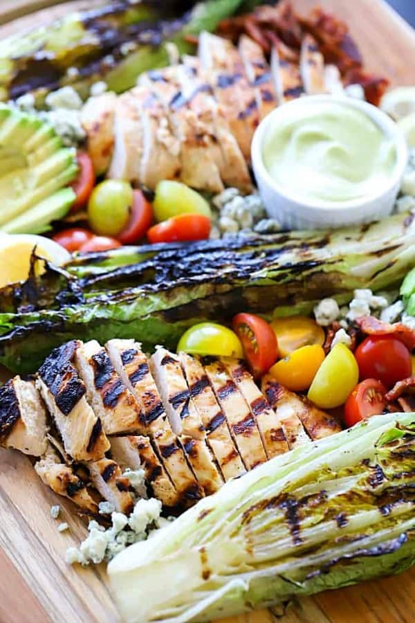 GRILLED COBB SALAD WITH AVOCADO DRESSING on a cutting board
