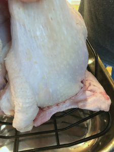Tuck the wings under the turkey