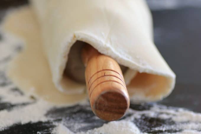 Pie dough rolled around a pin