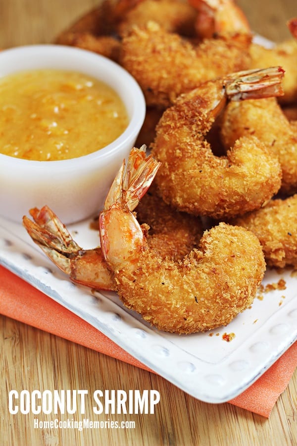Coconut Shrimp Recipes on a white plate with dip