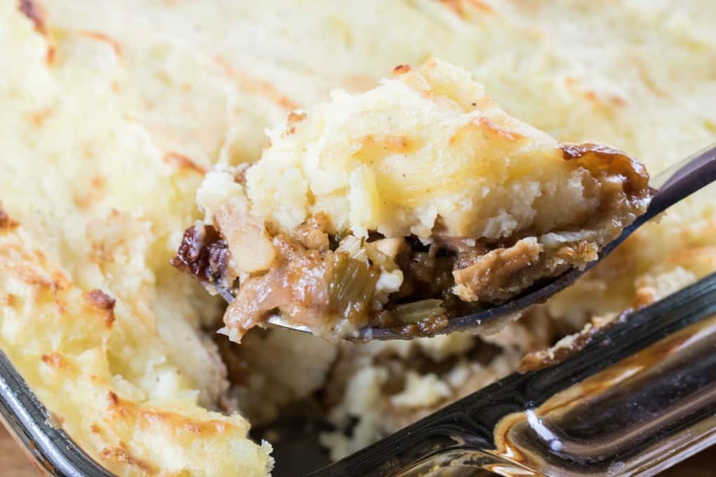 Close up of a spoonful of Leftover Turkey Casserole with Stuffing