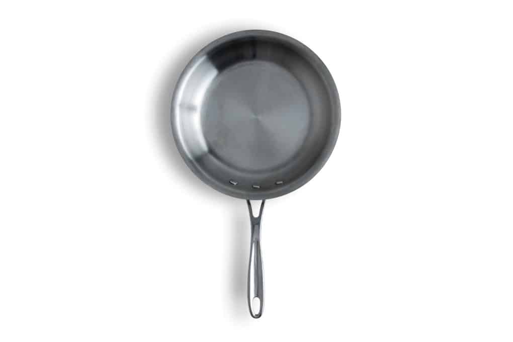 On overhead shot of a stainless steel fry pan. 