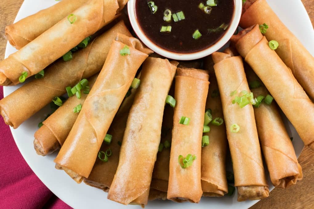 Overhead shot of spring rolls and dipping sauce