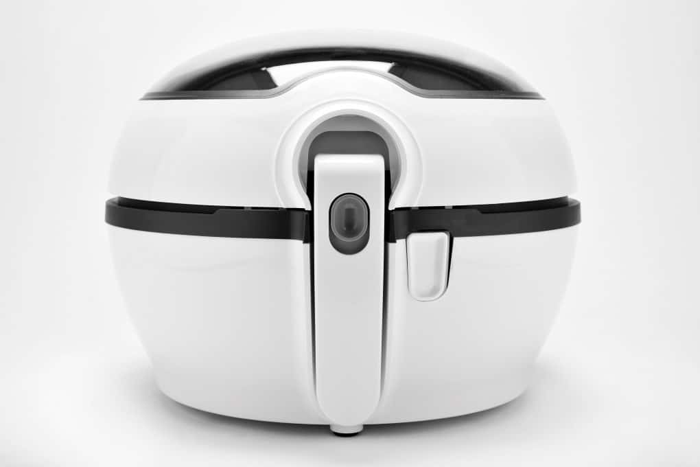 closeup of a white multicooker on a white background